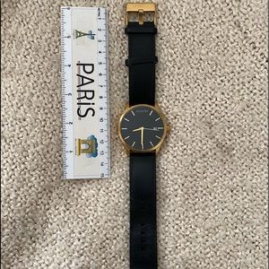 MVMT black and gold watch